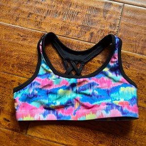 Justice sports bra. Great condition Size M. Bright fun colors.